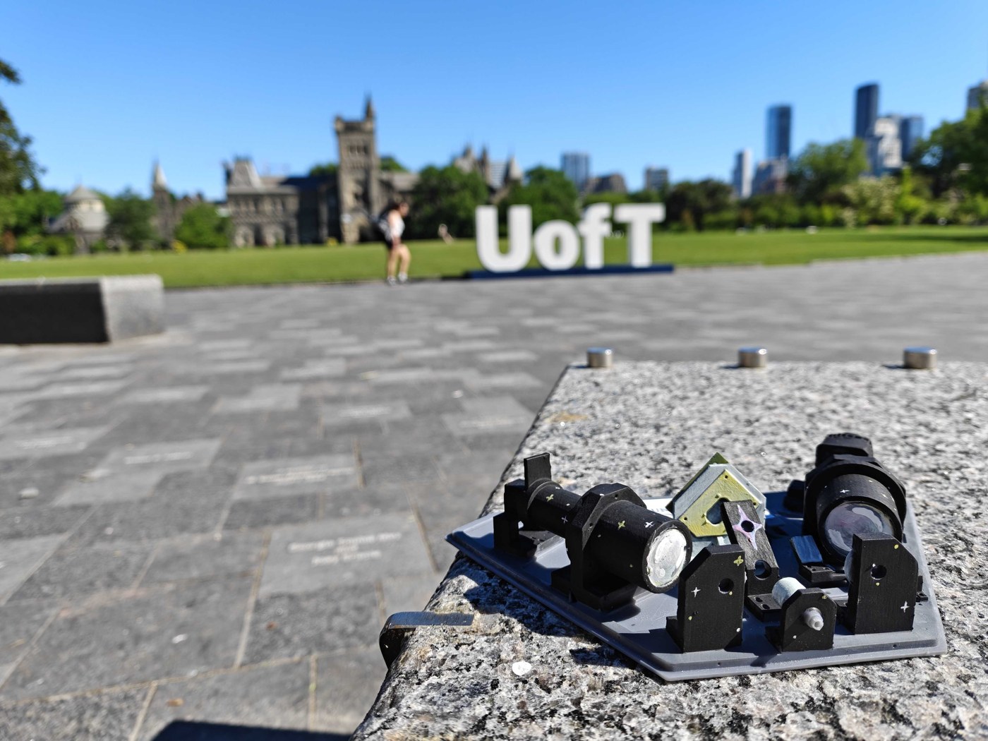 The DMD-MOS prototype spectrograph in front of the UofT sign on campus